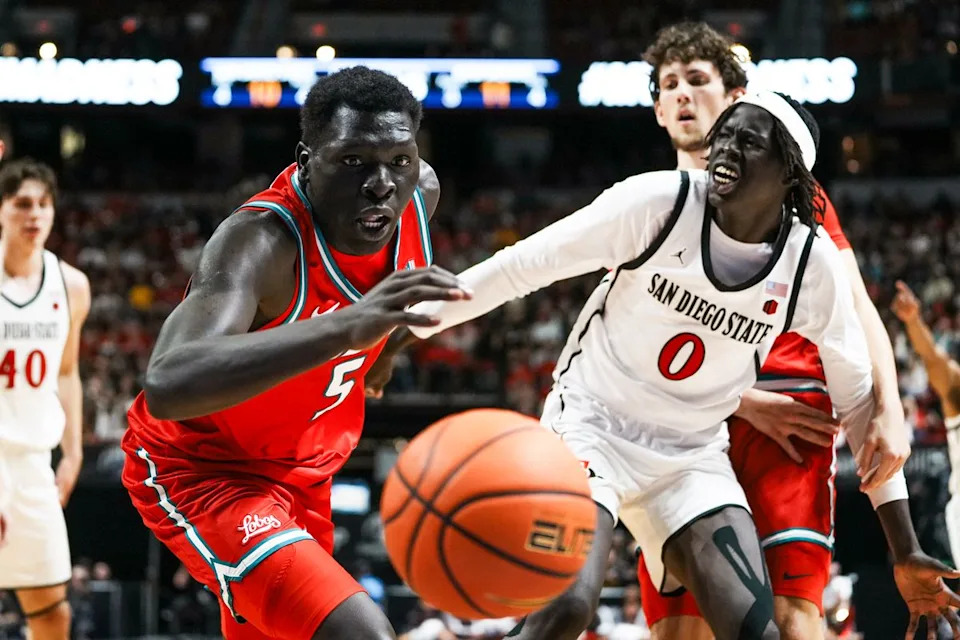 New Mexico Antonio Chol (5) reaches for the ball while it goes out of bounds during the semifinal of Mountain West Championship tournament game between San Diego State and New Mexico on Friday March 13, 2026 in Las Vegas, Nev.