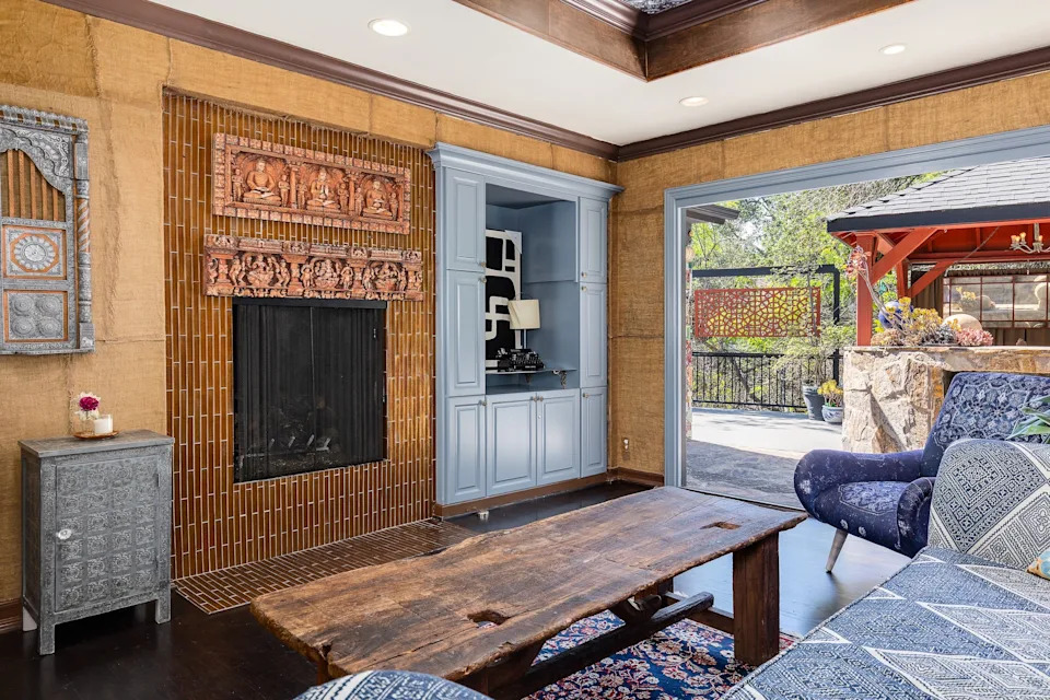 Farr made original crown molding and installed a tin ceiling inside the library living room.