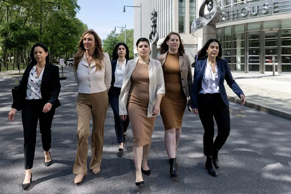 Nicole Daedone, second from left, founder and former CEO of OneTaste, second from left, departs Brooklyn federal court on Tuesday, June 13, 2023, in New York. Daedone, an entrepreneur who promoted group "orgasmic meditation," was sentenced to 9 years in prison on Monday, March 30, 2026. (Jeenah Moon/AP)