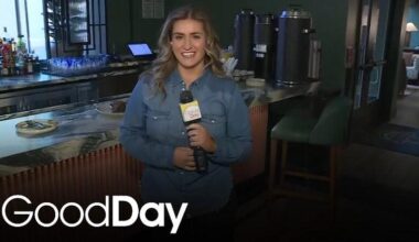 Bella is checking out the menu at Sheraton Grand Sacramento's Merchant25!