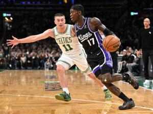 BOSTON, MASSACHUSETTS - JANUARY 30: Dennis Schroder #17 of the Sacramento Kings drives to the basket against Payton Pritchard #11 of the Boston Celtics during the first half at the TD Garden on January 30, 2026 in Boston, Massachusetts. NOTE TO USER: User expressly acknowledges and agrees that, by downloading and or using this photograph, User is consenting to the terms and conditions of the Getty Images License Agreement. (Photo by Brian Fluharty/Getty Images)