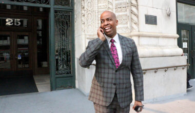 Paul Henderson speaks on the phone