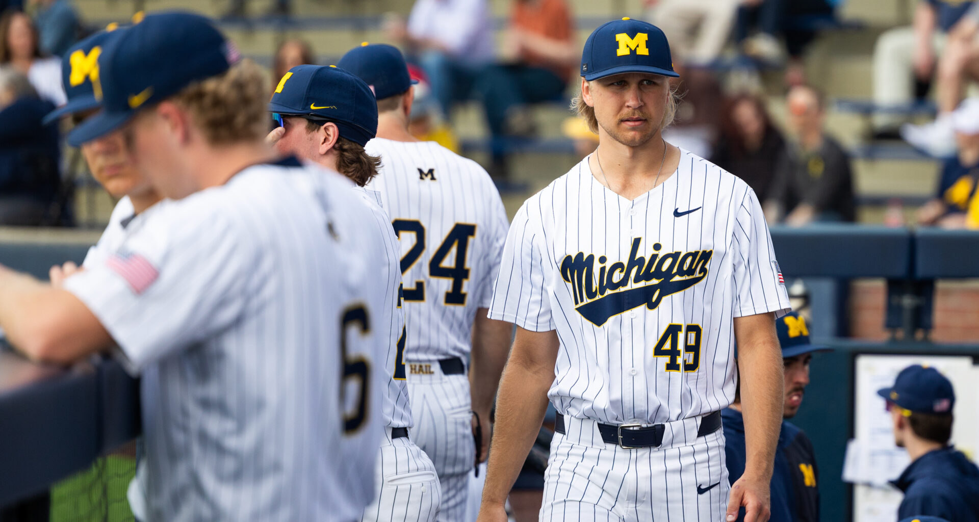 Walks wreck Michigan in comeback Oakland victory