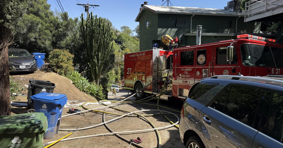 Home destroyed after fire threatens Hollywood Hills neighborhood, Los Angeles firefighters say