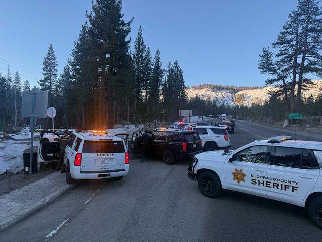 Officers with the California Highway Patrol and the El Dorado County Sheriff’s Office conduct a felony stop of a white sedan on Highway 50 near South Upper Truckee Road west of Meyers, Calif., on Thursday, March 5, 2026. The driver was taken into custody around 8:45 a.m. after a pursuit that began in Rancho Cordova.