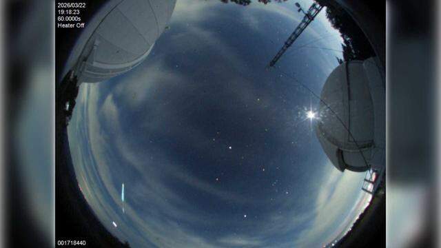 A meteor that streaked across the skies of Northern California on Sunday, March 22, 2026, is seen in the bottom left corner of a image taken from the Lick Observatory's SkyCam web camera on Mount Hamilton. The meteor was seen as a greenish streak across the Sacramento region.