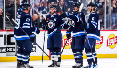 Morrissey scores winner in return, Jets rally to defeat Canucks in OT