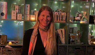 woman sitting in a darkened room
