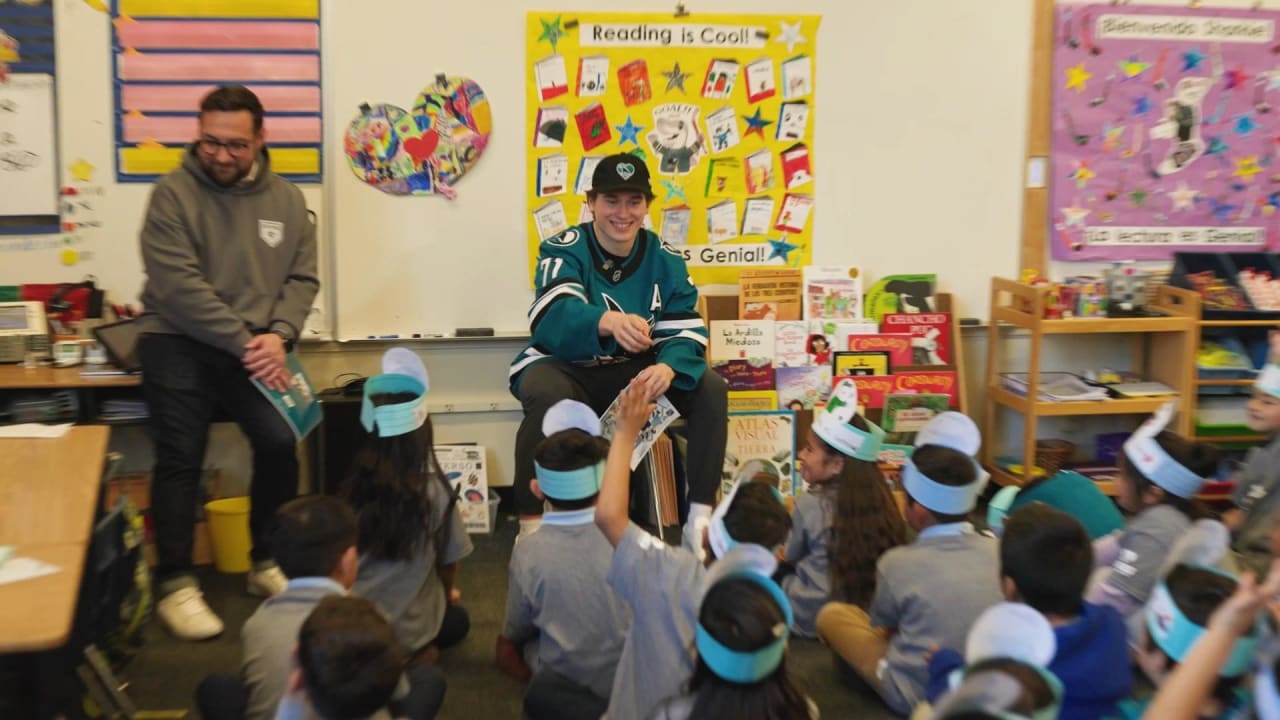 Sharks read to local students