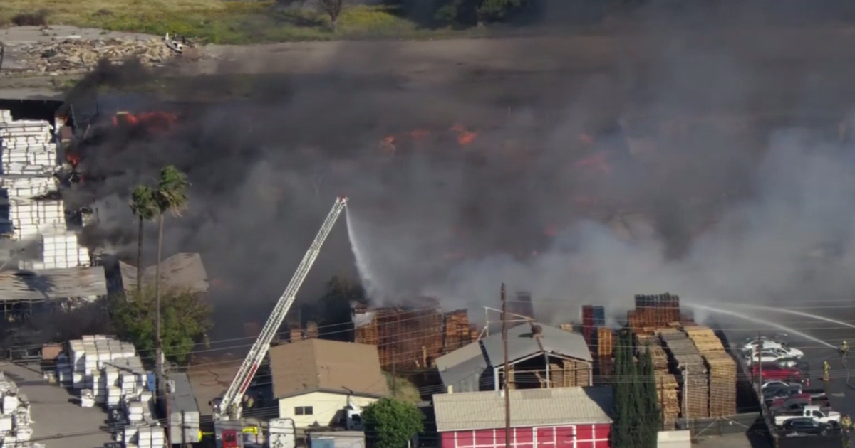 Riverside pallet yard fire forces evacuations as strong winds fuel flames
