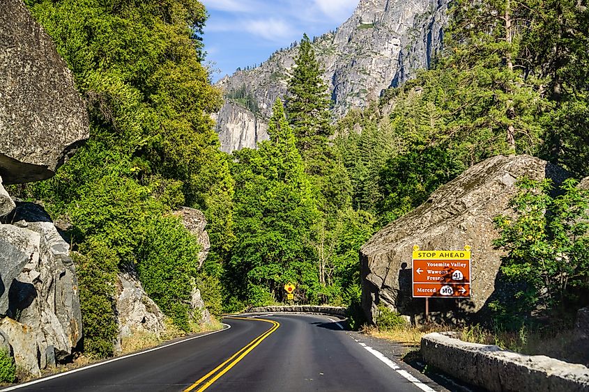 Road sign along Highway 120 leading toward Yosemite National Park.