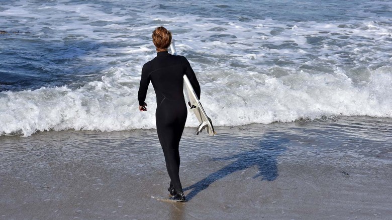 Surfer at Ocean Beach Pier. Photo by Chris Stone