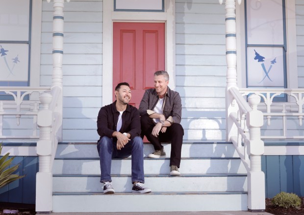 An's Gelato co-founders Kris Warren, left, and Travis Bailey on the steps of the famous Top Gun House on the grounds of the Mission Pacific Beach Resort in Oceanside on Friday, March 13. In May, San Diego-based An's will open its latest bespoke gelato shop inside the historic 1888 Folk Victorian cottage at 250 N. Pacific St. near the Oceanside Pier. (John Gastaldo / For the Union-Tribune)