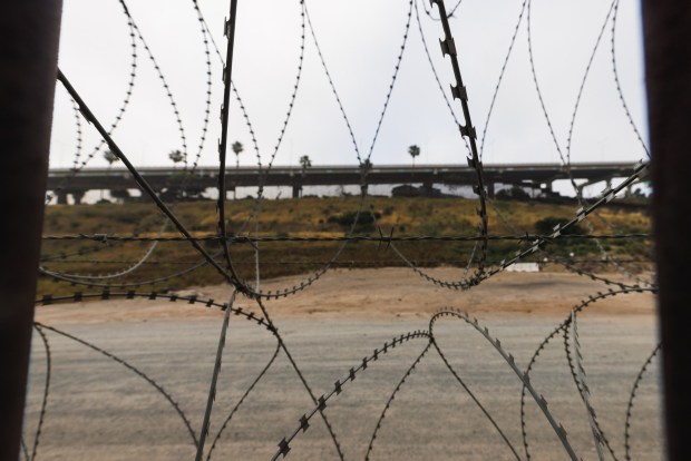 Concertina wire is seen installed at Whiskey 8, an area at the U.S.-Mexico border that migrants used to cross and turn themselves in to claim asylum, in San Ysidro on Friday, March 27 2026. (Kristian Carreon / The San Diego Union-Tribune)