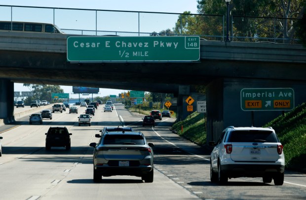 A freeway sign on Interstate 5 shows an offramp for Cesar E. Chavez Parkway on March 18, 2026, in San Diego.  (K.C. Alfred / The San Diego Union-Tribune)