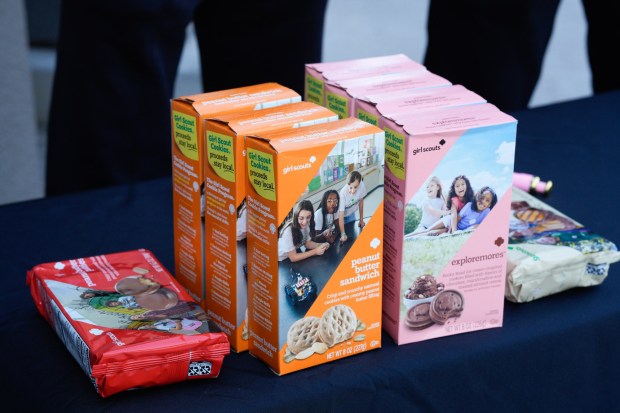 Lyric Nolan, 13, sold her batch of Girl Scout cookies from her booth table set up in front of a local grocery store on Third Avenue in Chula Vista. To date Nolan has sold more than 500 boxes of Girl Scout cookies. (Nelvin C. Cepeda / The San Diego Union-Tribune)