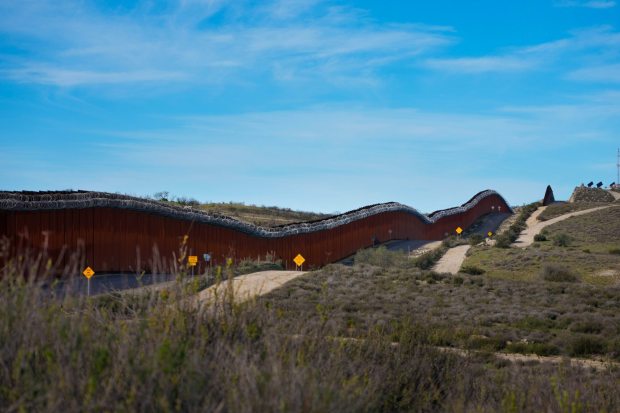 The border wall along the U.S.-Mexico border in Campo near the Pacific Crest Trail's southern terminus marker on Feb. 24, 2026.  (Nelvin C. Cepeda / The San Diego Union-Tribune)