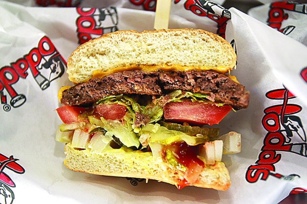 A bacon cheeseburger from Hodad's, which has several booths at Petco Park in San Diego. (U-T File)