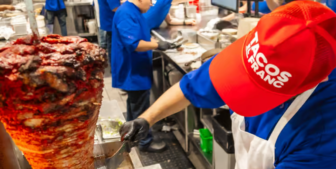 taco slicing from a vertical spit