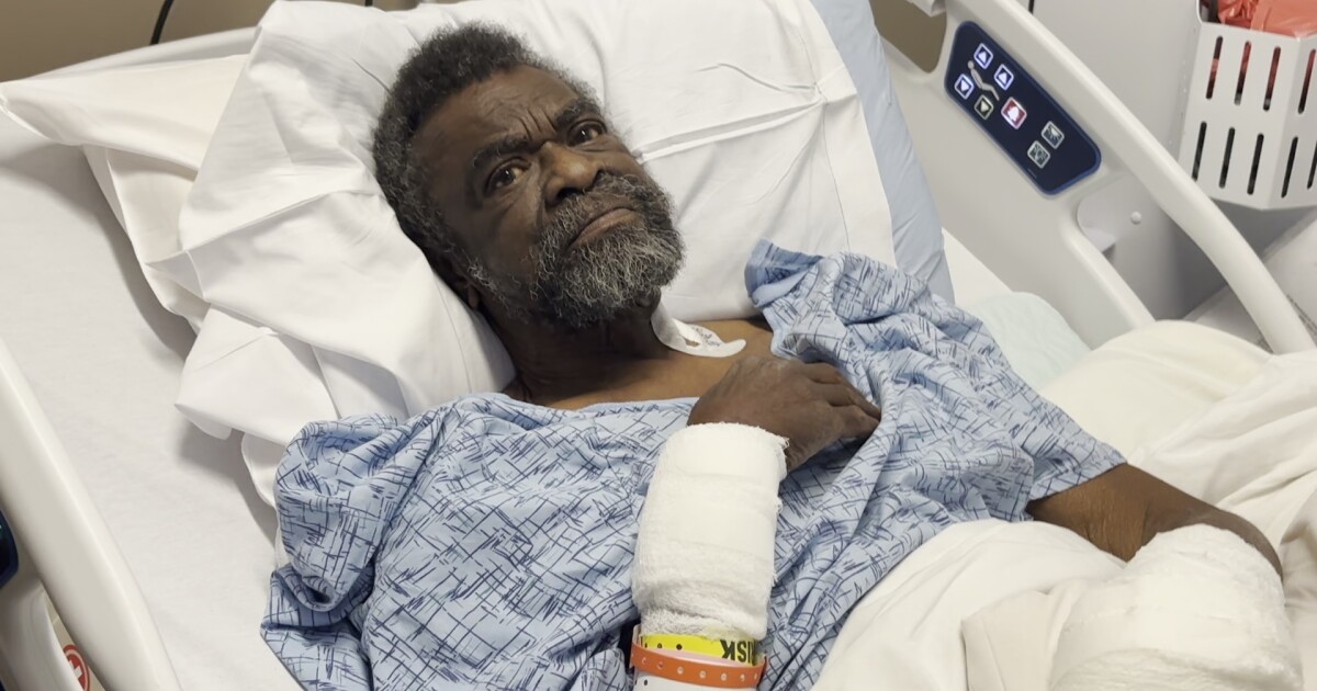 75-year-old man was hospitalized after he says transport left him in the heat