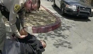 Deputy collected paychecks after excessive force conviction