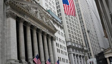 Stocks erase a big early loss and rise after oil prices drop from nearly $120 back below $90