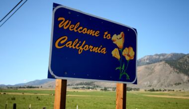 A road sign says welcome to California.