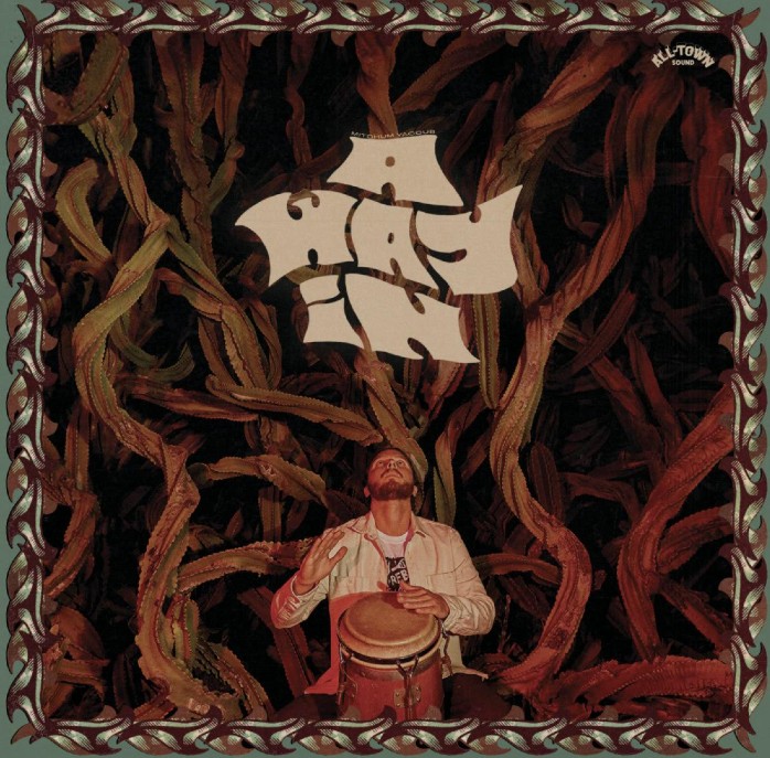 Art of a man, against a background of vines, playing the conga beneath the words "A Way In."