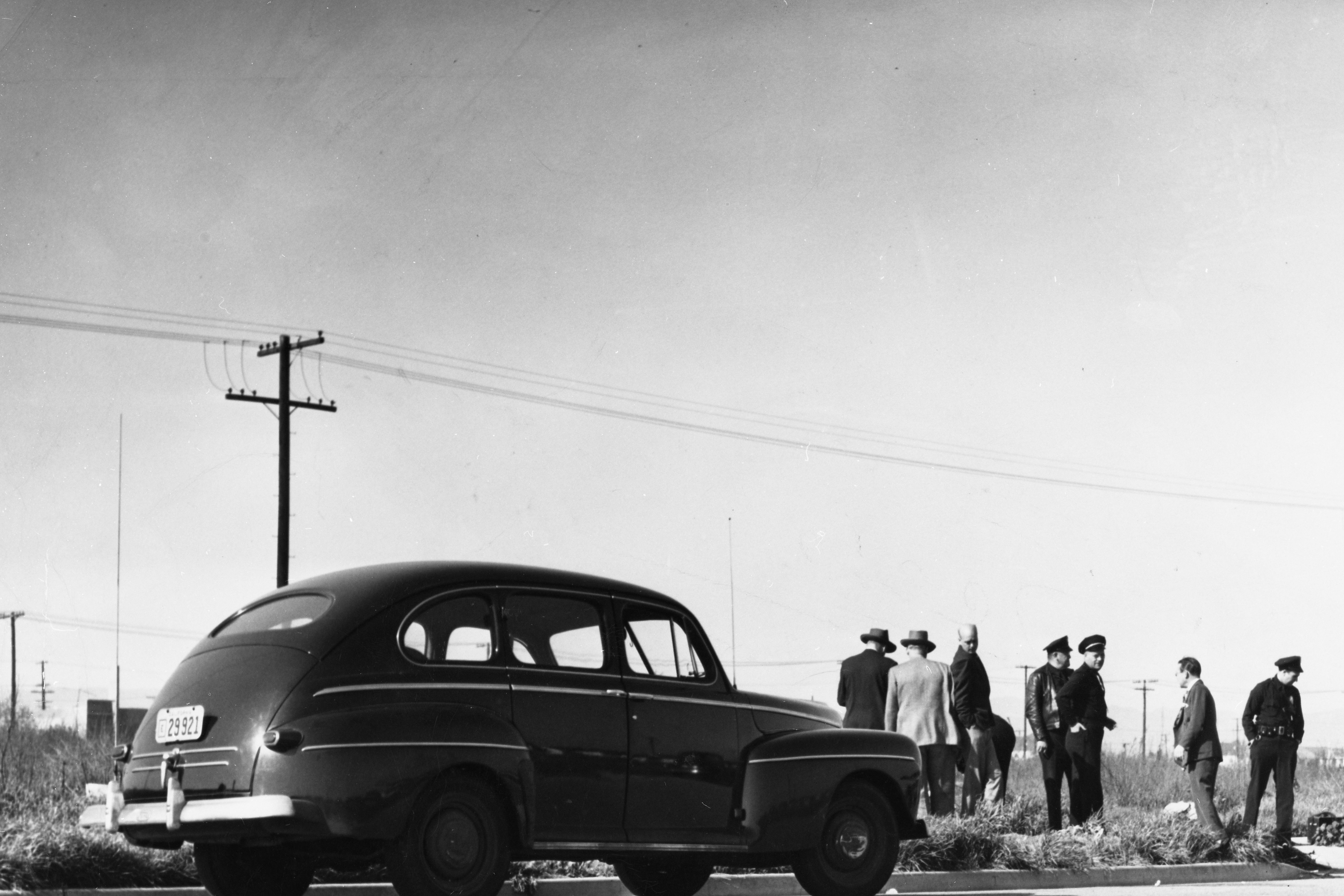 Archival image of police officers at a park.