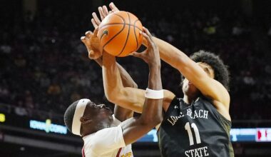 Iowa State Cyclones forward Killyan Toure (27) and Long Beach State guard Gavin Sykes (11) battle for rebound during the first half in the NCAA men’s basketball on Dec. 21, 2025, at Hilton Coliseum in Ames, Iowa.