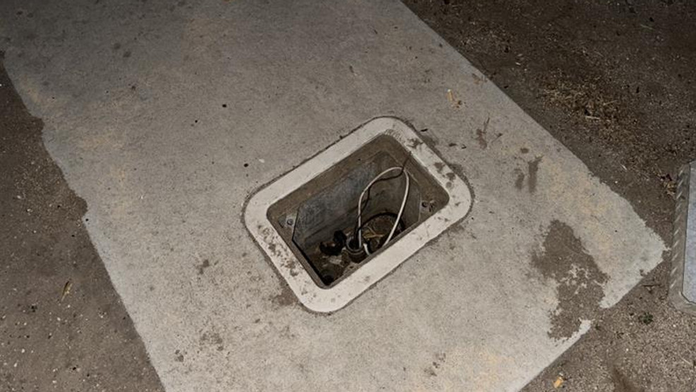 {p}Light pole access panels broken into (Photo: FOX26 Photojournalist Olen Hogenson){/p}