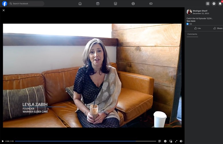 A screenshot of a social media video shows a person seated on a brown leather couch, holding a drink and speaking toward the camera. On-screen text identifies them as “Leyla Zabih, Founder, Warner Elder Care,” while the surrounding interface includes the platform’s navigation bar, user name, post date, and engagement options.