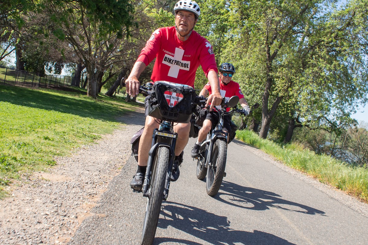 American River Bike Patrol members Vic Massenkoff (left) and Christopher Warren Tuesday, March 17, 2026, along the American River Parkway in Rancho Cordova.