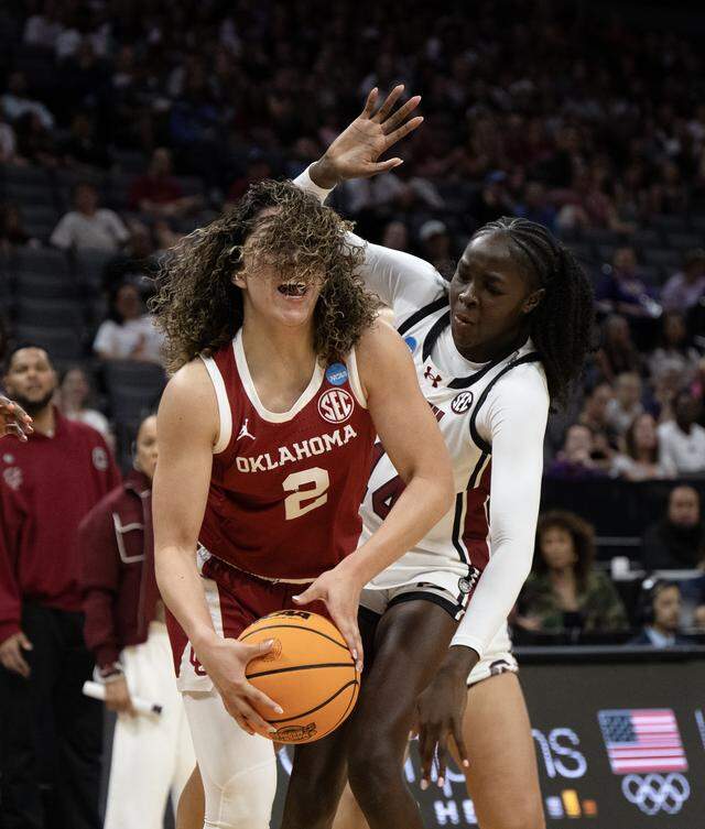 Oklahoma Sooners guard Aaliyah Chavez (2) shoots as South Carolina Gamecocks guard Agot Makeer (44) defends In the first half of the NCAA Women’s Basketball Tournament Sweet 16 on Saturday, March 28, 2026 at Golden 1 Center.