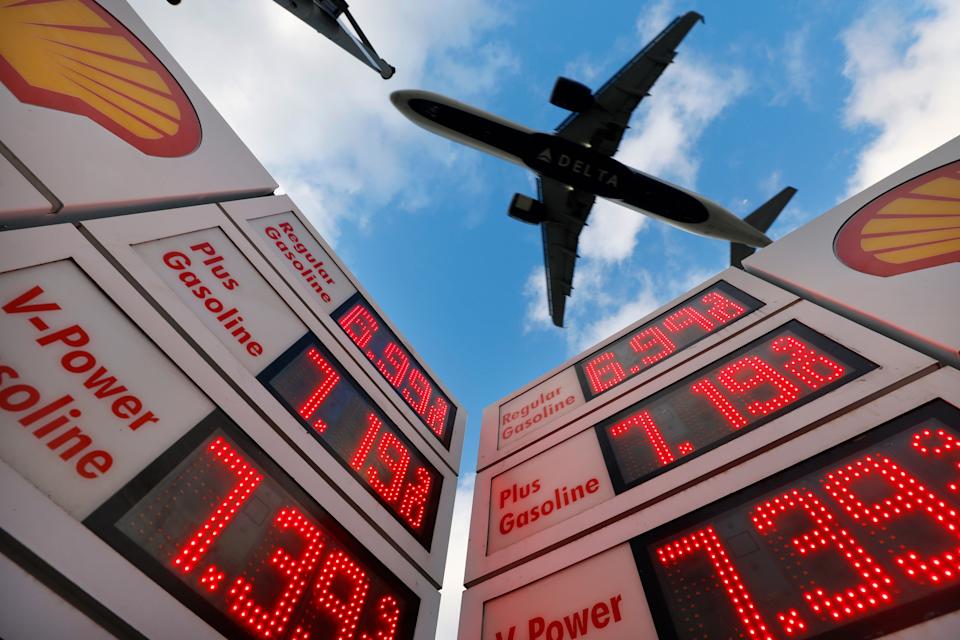 SAN DIEGO, CALIFORNIA - APRIL 24: Gas prices are displayed at a Shell gas station as an airplane approaches San Diego International Airport for a landing on April 24, 2026 in San Diego, California.  (Photo by Kevin Carter/Getty Images)