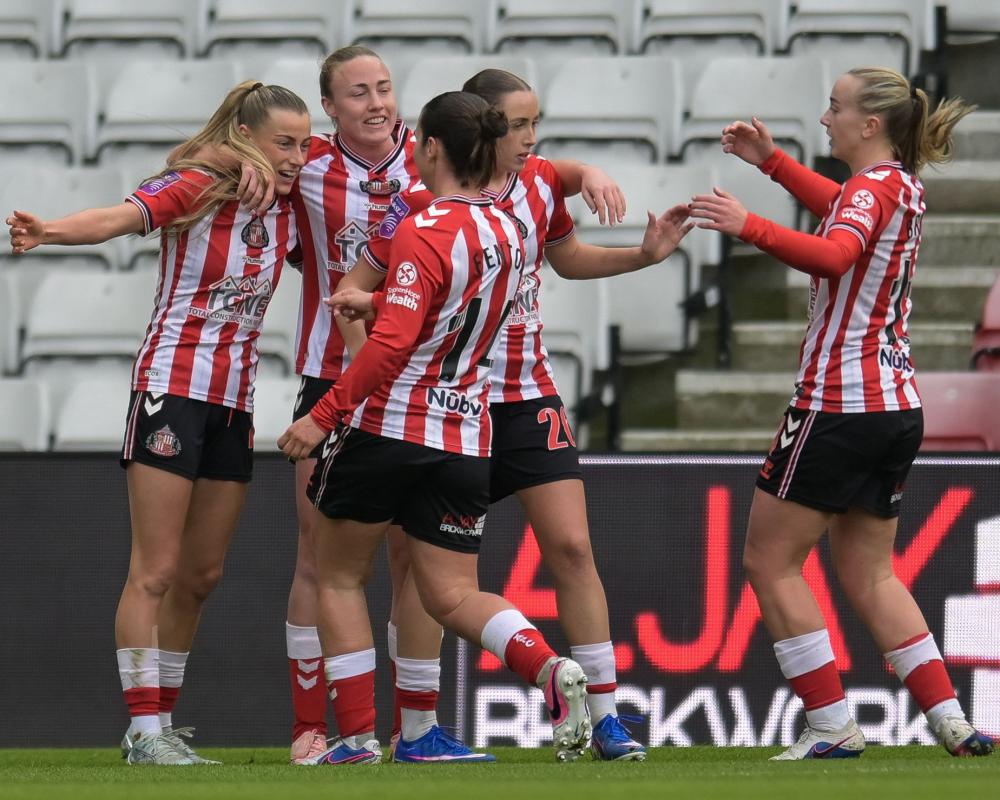 Sunderland players celebrate Katy Watson's goal against Newcastle United at the Stadium of Light.