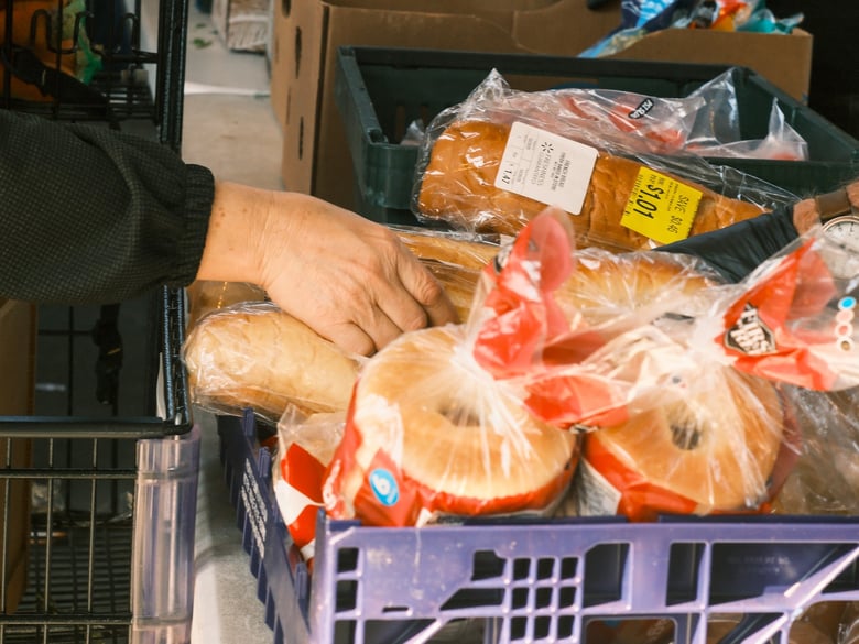 A shopper picks out bagels at River City Food Bank. Oct. 30, 2025 A shopper picks out bagels at River City Food Bank. Oct. 30, 2025