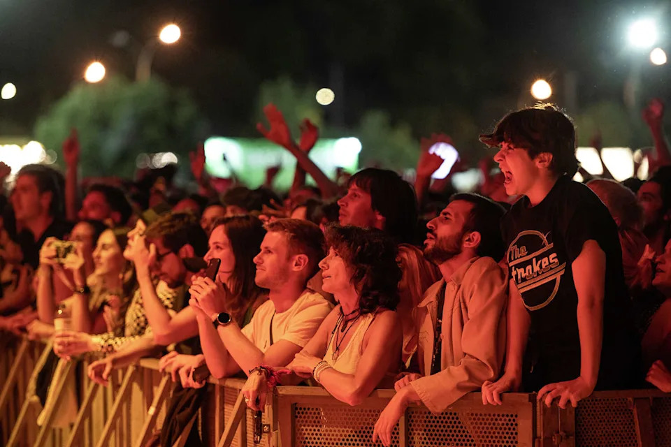Fans watch the Strokes perform on the NOS stage during the NOS Alive festival on July 6, 2022, in Lisbon, Portugal. (Pedro Gomes/Redferns)