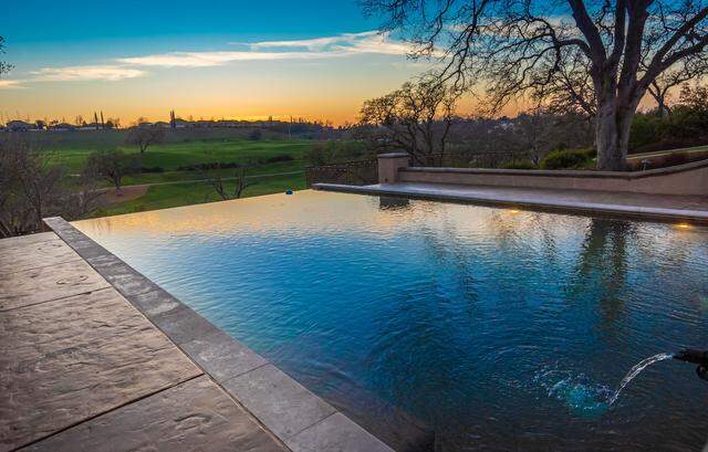 The first hole at Catta Verdera Country Club golf course can be seen from the backyard.