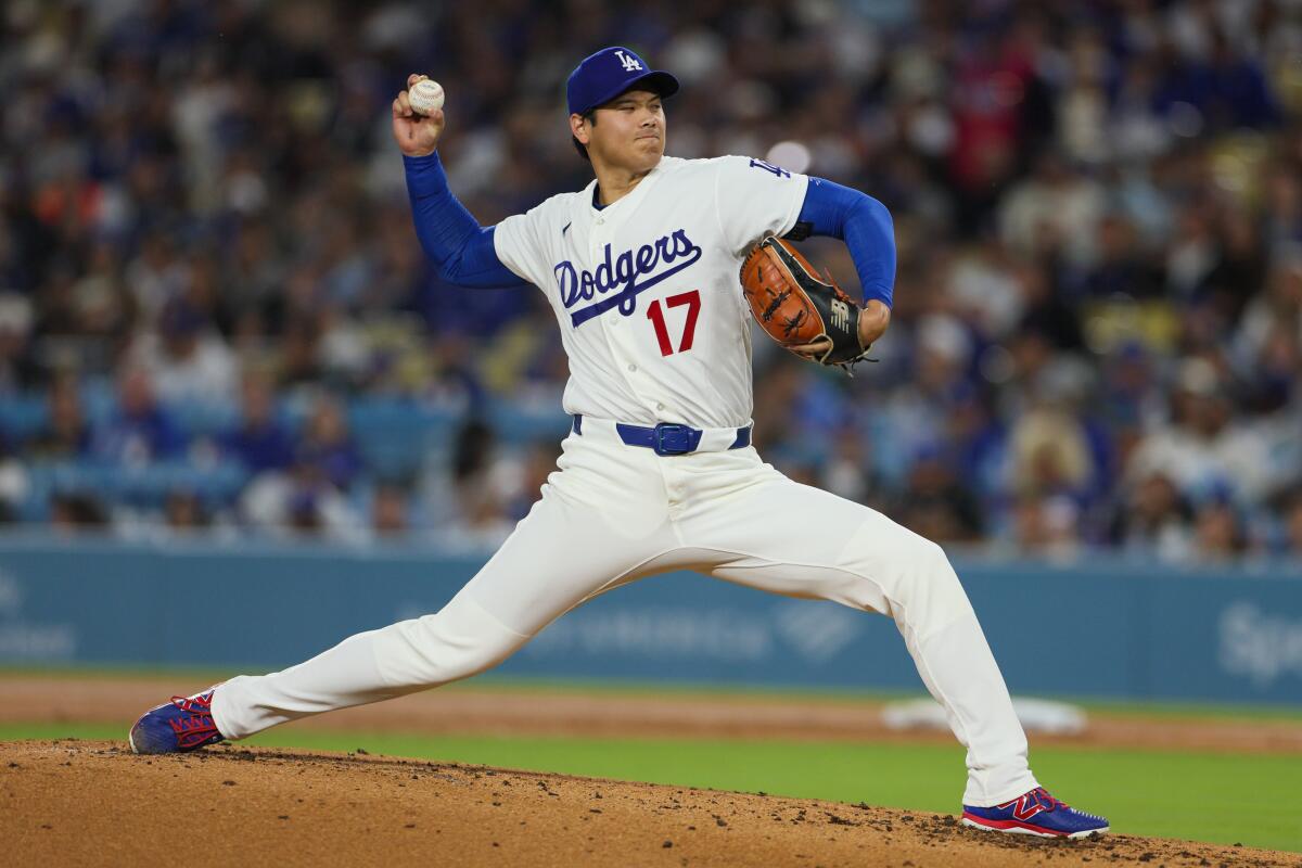 Dodgers pitcher Shohei Ohtani delivers during the second inning of a 4-1 win over the Cleveland Guardians.