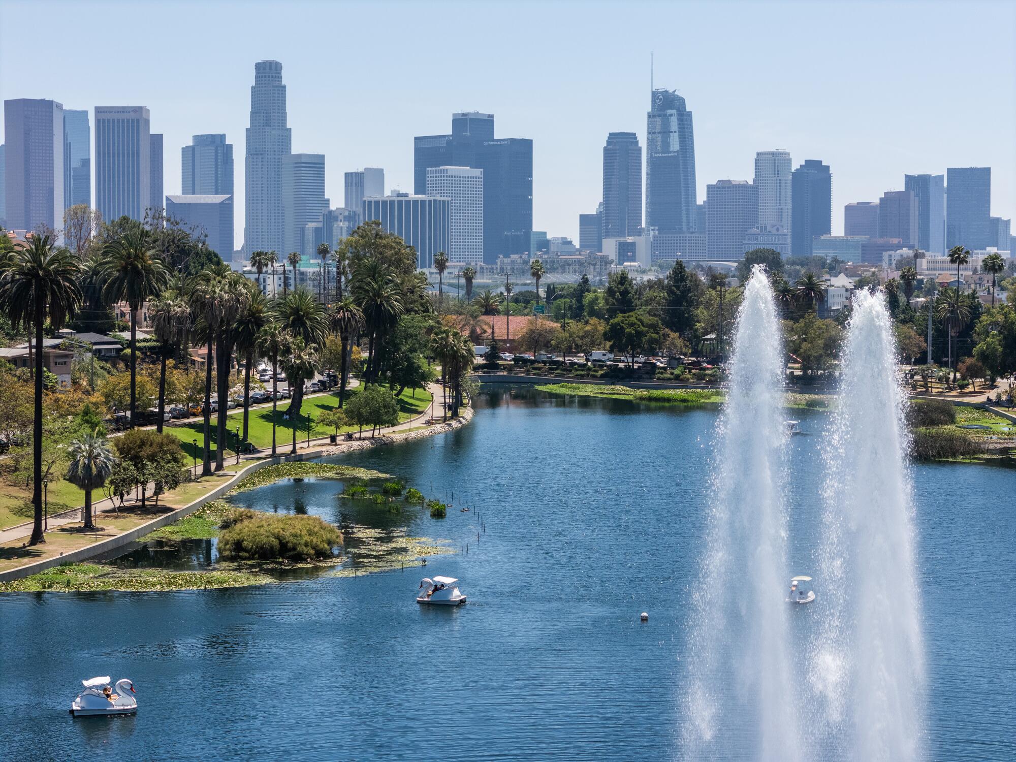 Boats glide on Echo Park Lake