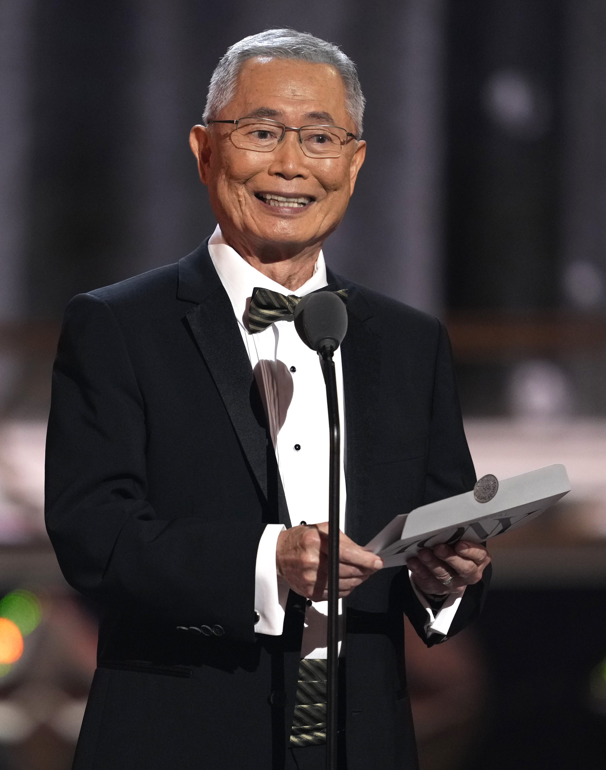 George Takei presents the award for best sound design of...