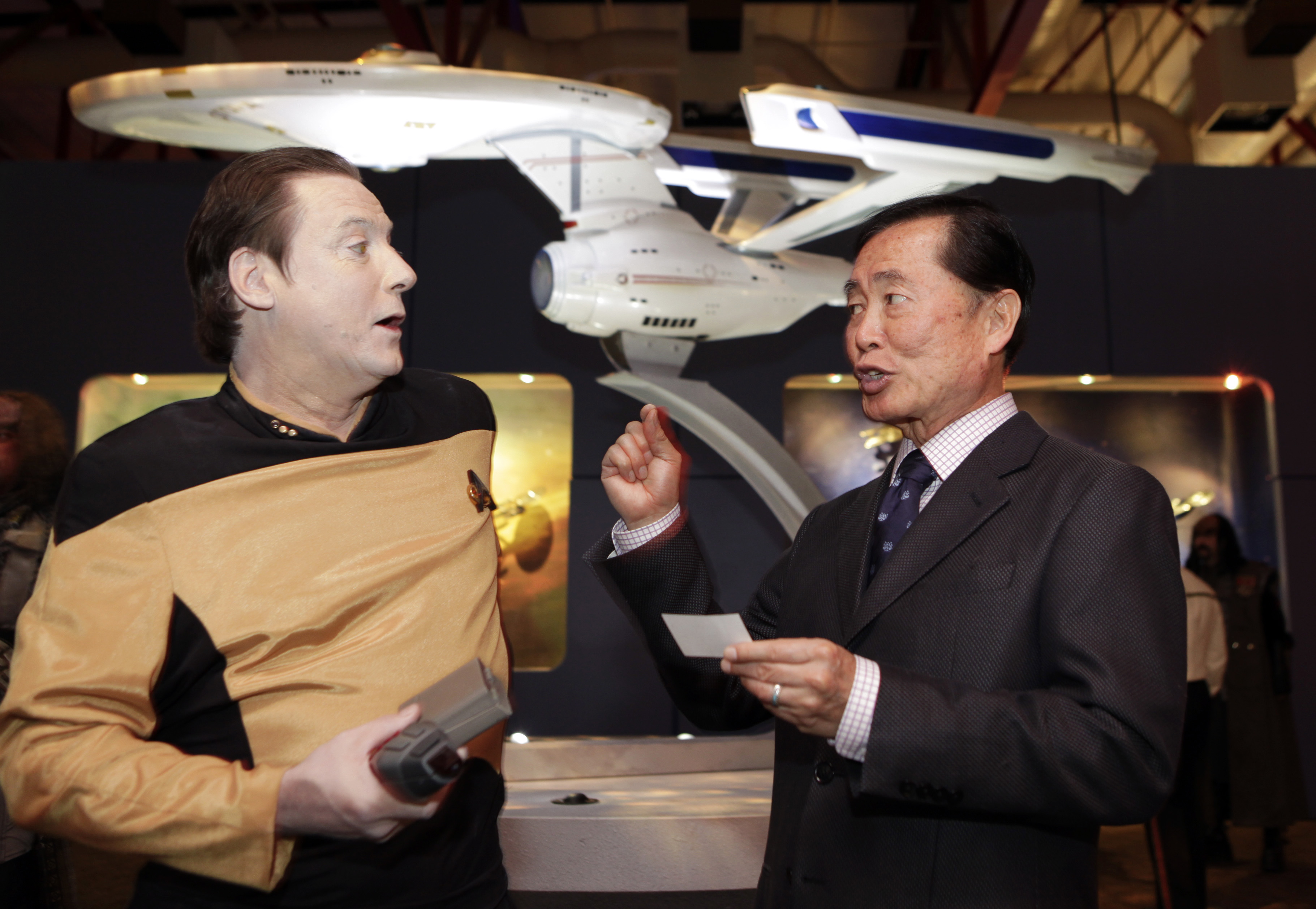 Actor George Takei, right, who played the role of helm...