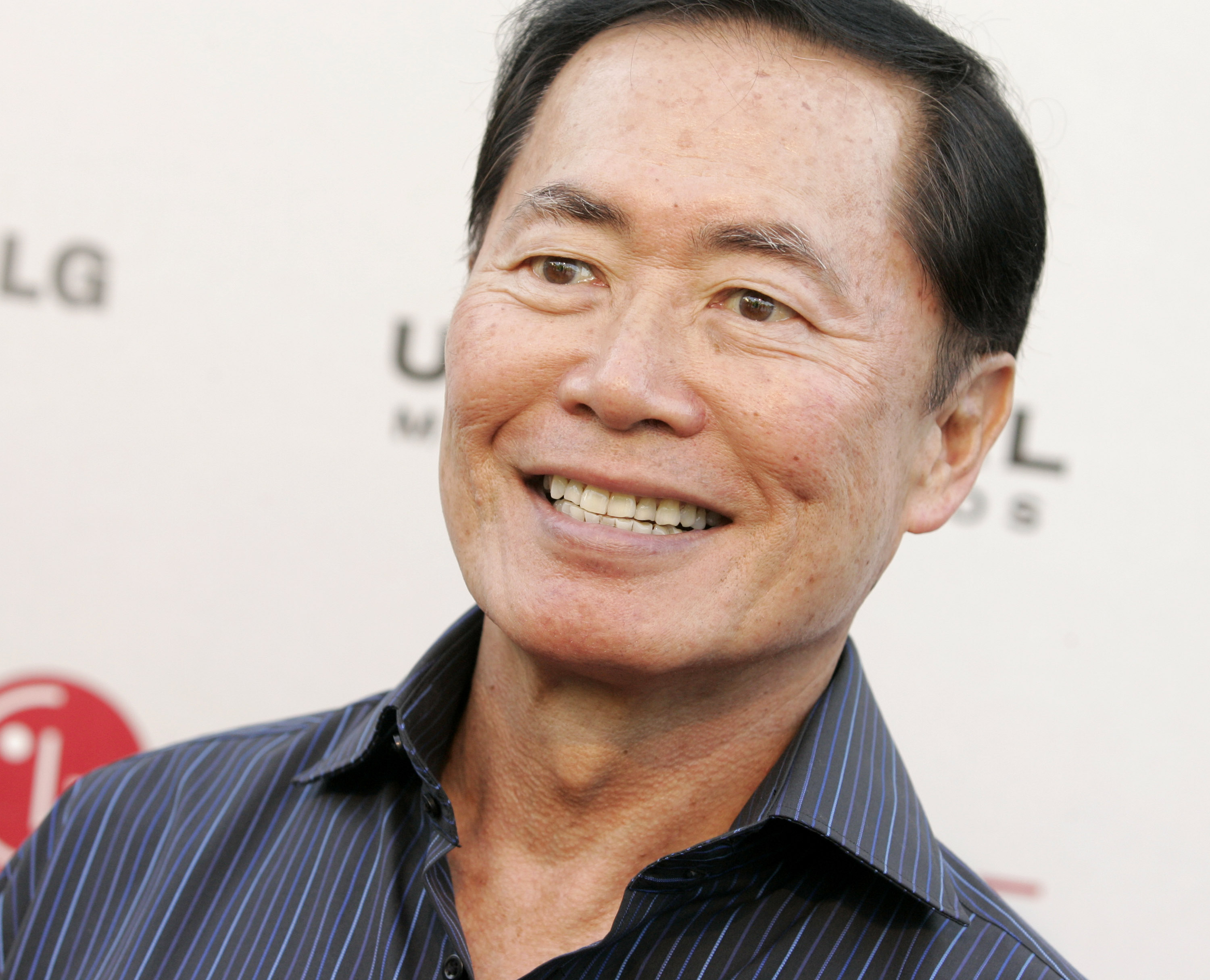 Actor George Takei poses on the press line at the...