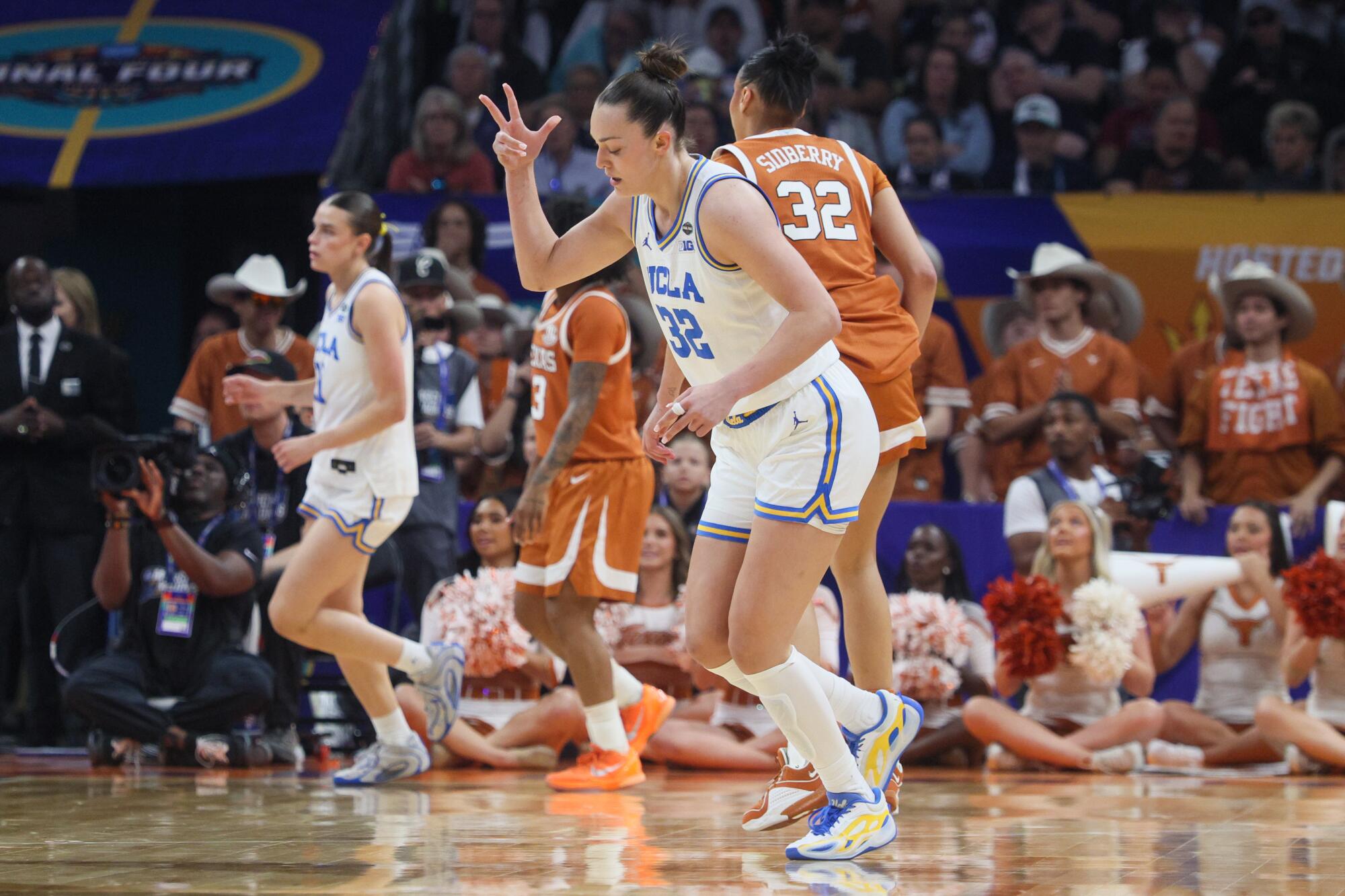 UCLA forward Angela Dugalic celebrates after making a three-pointer against Texas.