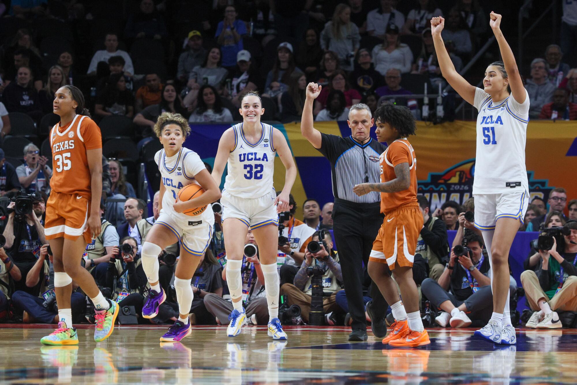 UCLA players (from left) Kiki Rice, Angela Dugalic and Lauren Betts react in the final seconds of the Bruins' win.
