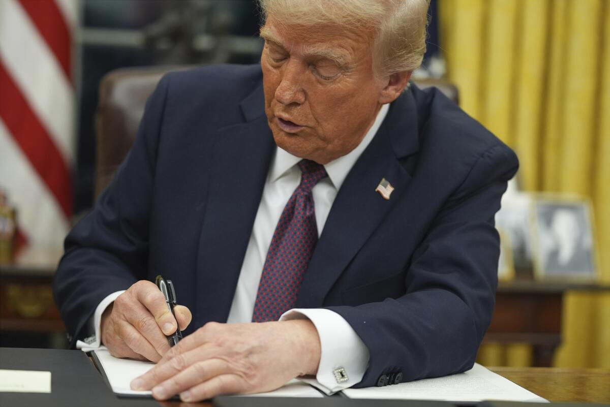 President Donald Trump signs an executive order on birthright citizenship