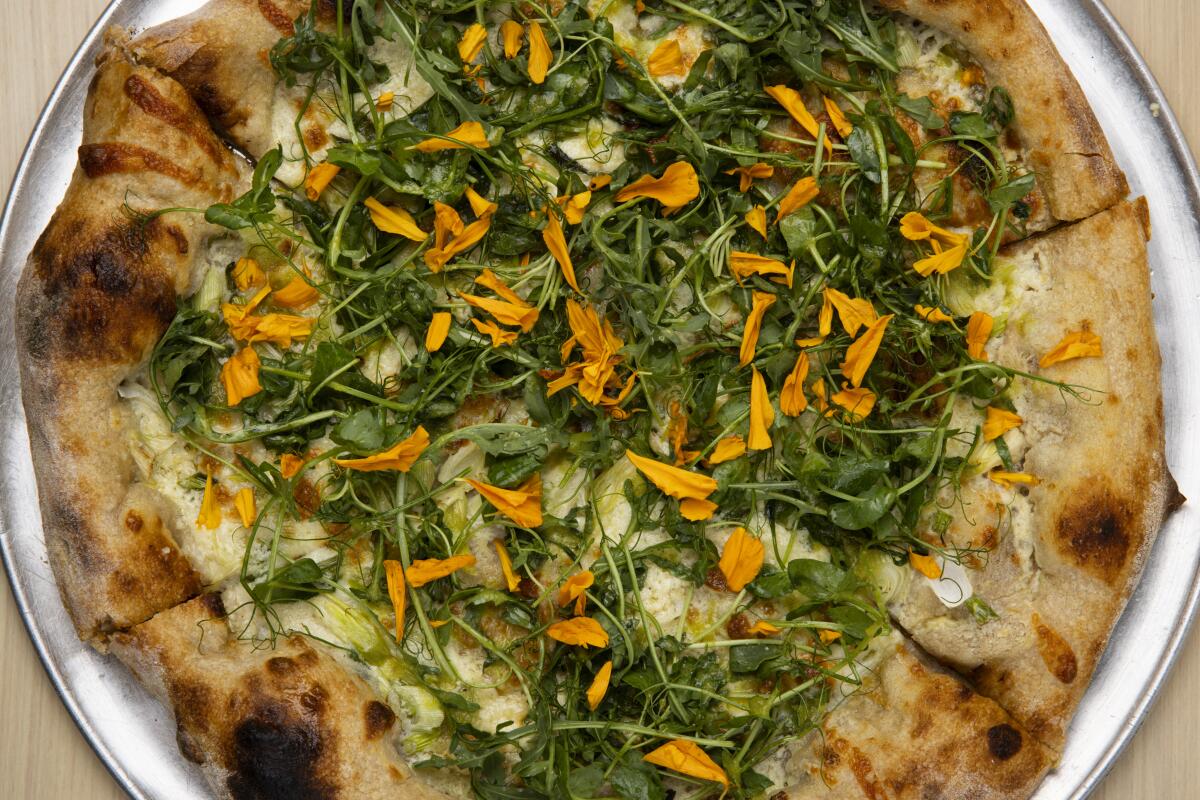 The Green Garlic and Spring Onion Pizza at Colossus Harbor in San Pedro.