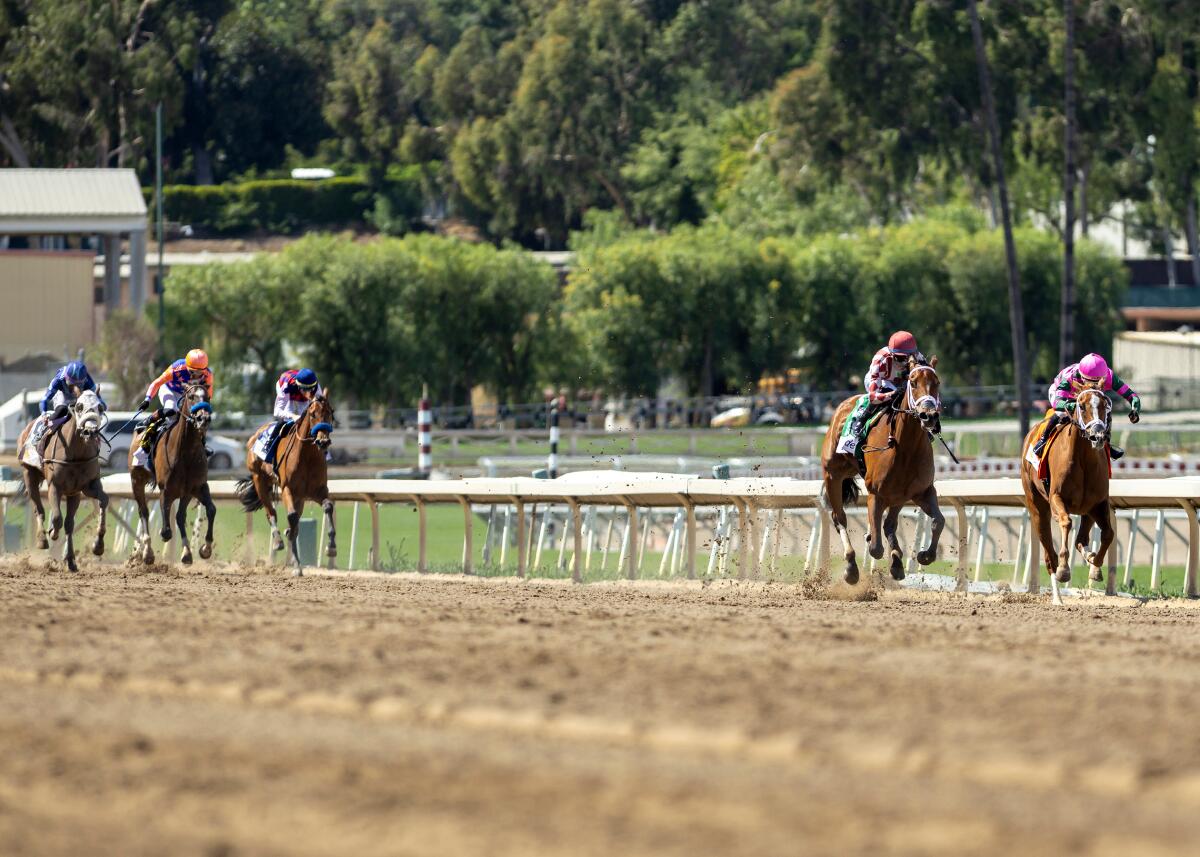 Meaning and jockey Juan Hernandez, second from right, beat Brooklyn Blonde and jockey Kazushi Kimura in the Santa Anita Oaks 