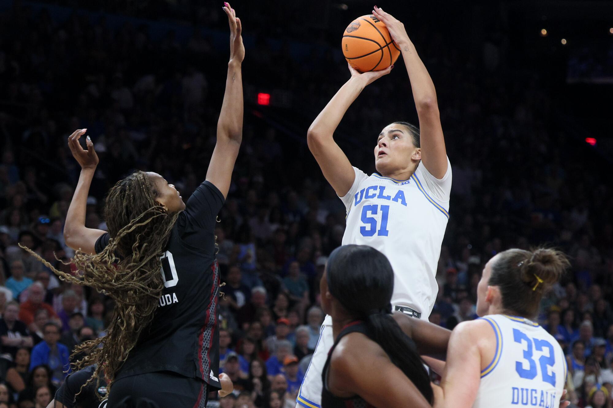 UCLA's Lauren Betts shoots over South Carolina's Maryam Dauda in the first half.